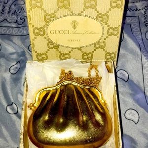 Gold Gucci hard Coin Purse